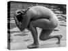 Naked woman posing on edge of swimming pool-Panoramic Images-Stretched Canvas