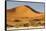Namibia, Namib-Naukluft National Park, Sossusvlei. Large red dune rising from a while pan.-Ellen Goff-Framed Stretched Canvas
