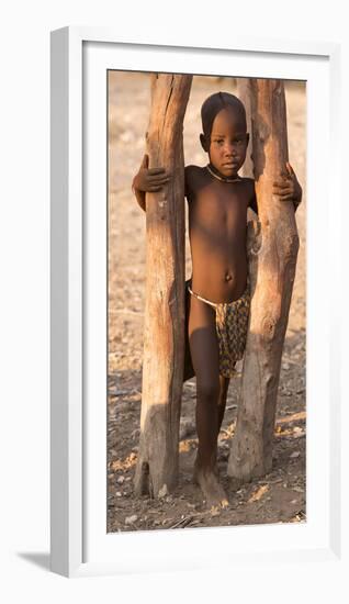 Namibia, Opuwo. Young Himba child in late afternoon light.-Wendy Kaveney-Framed Photographic Print