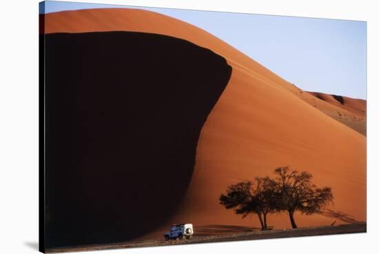 Namibia, Sossusvlei, Namib-Naukluft NP, Dune and Land Rover, Sunset-Walter Bibikow-Stretched Canvas