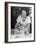 Nancy Drooling over a Pineapple Cake-Nina Leen-Framed Photographic Print