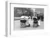 Nannies and Children Strolling in Park-null-Framed Photographic Print