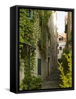 Narrow alley with historic stone buildings, Trogir, Dalamatia, Croatia-Merrill Images-Framed Stretched Canvas