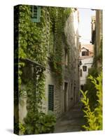 Narrow alley with historic stone buildings, Trogir, Dalamatia, Croatia-Merrill Images-Stretched Canvas