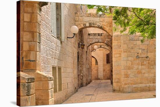 Narrow Cobbled Street among Traditional Stoned Houses of Jewish Quarter at Old Historic Part of Jer-rglinsky-Stretched Canvas