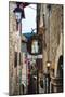 Narrow Medieval Street with Signs and Lamps, Sermoneta, Italy-George Oze-Mounted Photographic Print