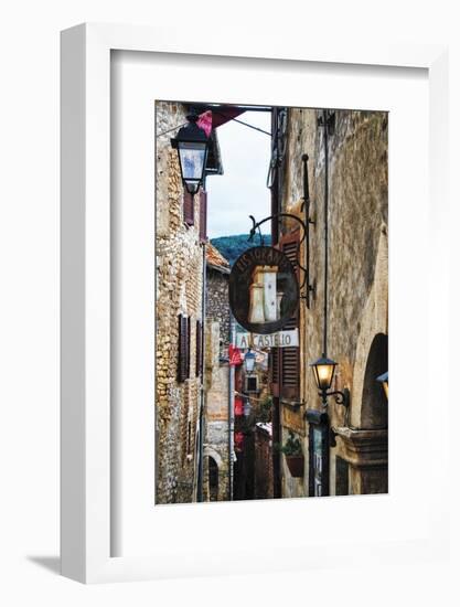 Narrow Medieval Street with Signs and Lamps, Sermoneta, Italy-George Oze-Framed Photographic Print