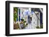 Narrow street, whitewashed buildings with blue paint work, flowers, Mykonos Town (Chora), Mykonos,-Eleanor Scriven-Framed Premium Photographic Print