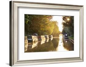 Narrowboats moored on the Kennet and Avon Canal at sunset, Kintbury, Berkshire, England-Stuart Black-Framed Photographic Print