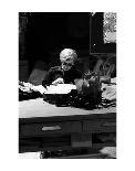 Andy at Typewriter, The Factory, NYC, circa 1965-Andy Warhol/ Nat Finkelstein-Art Print