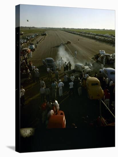 National Hot Rod Association's National Opening Drag Race Held at the Orange County Airport-Ralph Crane-Stretched Canvas