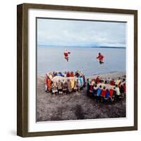 Native Alaskans Playing a Game of Nulukatuk, in Which Individals are Tossed into the Air-Ralph Crane-Framed Photographic Print