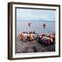 Native Alaskans Playing a Game of Nulukatuk, in Which Individals are Tossed into the Air-Ralph Crane-Framed Photographic Print