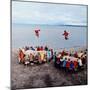 Native Alaskans Playing a Game of Nulukatuk, in Which Individals are Tossed into the Air-Ralph Crane-Mounted Photographic Print