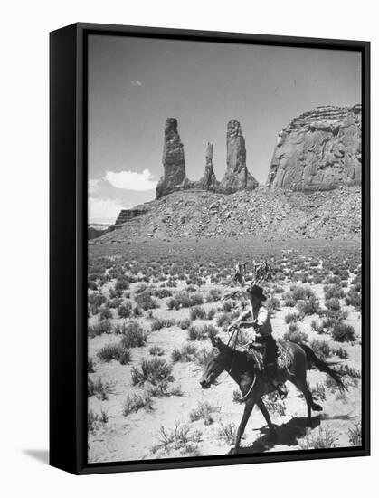 Native American Indian Boy Running His Horse Through Desert-Loomis Dean-Framed Stretched Canvas