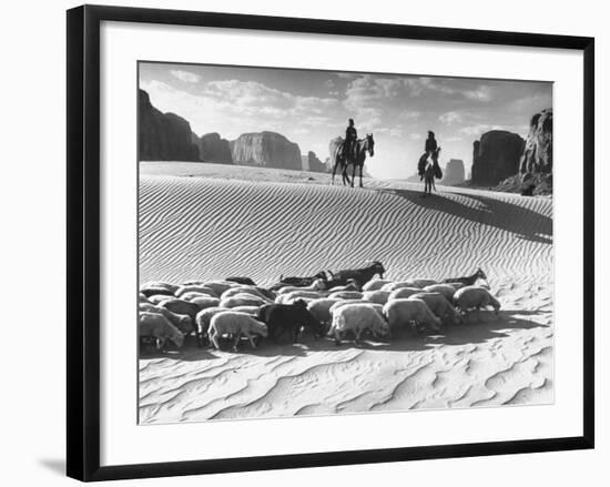 Native American Indians Herding their Sheep Through Desert-Loomis Dean-Framed Photographic Print