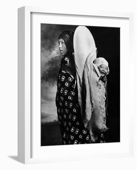 Native American Mother and Her Baby, Happily Hanging on Her Back in Glacier Park-Emil Otto Hoppé-Framed Photographic Print