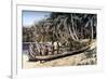 Native Canoe on a Palm Shaded Beach, Solomon Islands, C1923-York & Son-Framed Giclee Print