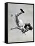 Natl. Women's Tumbling Champion, 15 Year Old, Bonnie Nebelong, in Mid Air with Legs Akimbo-Gjon Mili-Framed Stretched Canvas