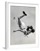 Natl. Women's Tumbling Champion, 15 Year Old, Bonnie Nebelong, in Mid Air with Legs Akimbo-Gjon Mili-Framed Photographic Print