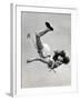 Natl. Women's Tumbling Champion, 15 Year Old, Bonnie Nebelong, in Mid Air with Legs Akimbo-Gjon Mili-Framed Photographic Print