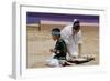 Navajo Blue Eagle Dancers Performing the Corn-Grinding Dance at the Gallup Intertribal Ceremonials,-null-Framed Giclee Print