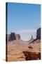 Navajo Man on Horseback, Monument Valley Navajo Tribal Park, Monument Valley, Utah-Michael DeFreitas-Stretched Canvas