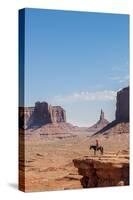 Navajo Man on Horseback, Monument Valley Navajo Tribal Park, Monument Valley, Utah-Michael DeFreitas-Stretched Canvas