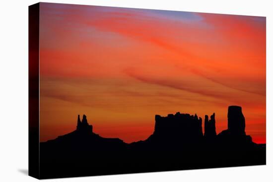Navajo Nation, Monument Valley, Sunrise over Mitten Rock Formations-David Wall-Stretched Canvas