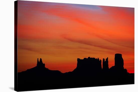 Navajo Nation, Monument Valley, Sunrise over Mitten Rock Formations-David Wall-Stretched Canvas