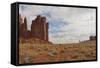 Navajo Person Rides a Horse Between Rock Formations-Eleanor Scriven-Framed Stretched Canvas