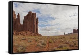 Navajo Person Rides a Horse Between Rock Formations-Eleanor Scriven-Framed Stretched Canvas