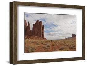 Navajo Person Rides a Horse Between Rock Formations-Eleanor Scriven-Framed Photographic Print