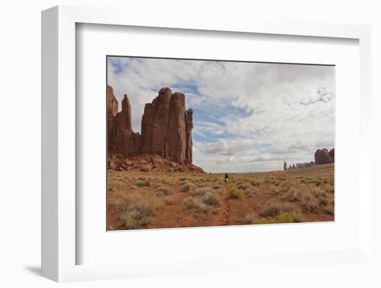 Navajo Person Rides a Horse Between Rock Formations-Eleanor Scriven-Framed Photographic Print