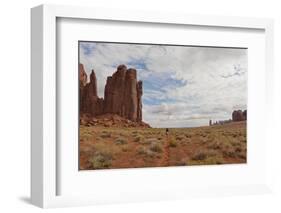 Navajo Person Rides a Horse Between Rock Formations-Eleanor Scriven-Framed Photographic Print