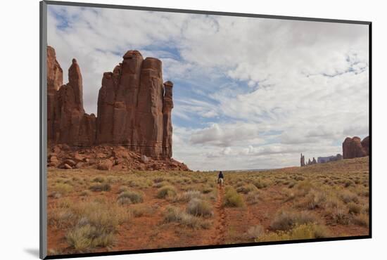 Navajo Person Rides a Horse Between Rock Formations-Eleanor Scriven-Mounted Photographic Print