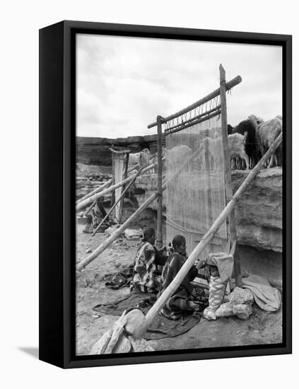 Navajo Women Weaving Blankets Photograph-Lantern Press-Framed Stretched Canvas