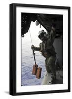 Naval Aircrewman Conducts a Search and Rescue Drill on an Mh-60S Sea Hawk-null-Framed Photographic Print