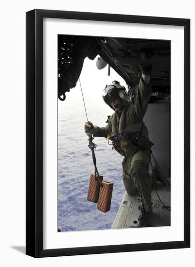 Naval Aircrewman Conducts a Search and Rescue Drill on an Mh-60S Sea Hawk-null-Framed Photographic Print