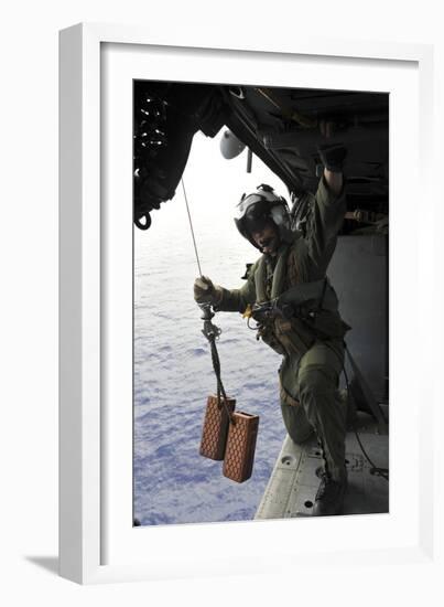 Naval Aircrewman Conducts a Search and Rescue Drill on an Mh-60S Sea Hawk-null-Framed Photographic Print