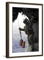 Naval Aircrewman Conducts a Search and Rescue Drill on an Mh-60S Sea Hawk-null-Framed Photographic Print