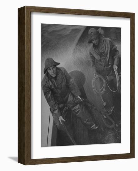 Naval Officers Working on a Ship During a Storm-George Strock-Framed Photographic Print