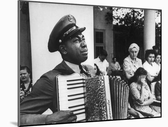 Navy CPO Graham Jackson Playing Accordian, Crying as Franklin D Roosevelt's Body is Carried Away-Ed Clark-Mounted Photographic Print