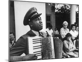 Navy CPO Graham Jackson Playing Accordian, Crying as Franklin D Roosevelt's Body is Carried Away-Ed Clark-Mounted Photographic Print