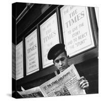 Navy Editor and Feature Writer For Stars and Stripes Reading a Copy of an Issue-David Scherman-Stretched Canvas