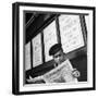 Navy Editor and Feature Writer For Stars and Stripes Reading a Copy of an Issue-David Scherman-Framed Photographic Print