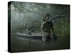 Navy SEALs Navigate the Waters in a Folding Kayak During Jungle Warfare Operations-Stocktrek Images-Stretched Canvas
