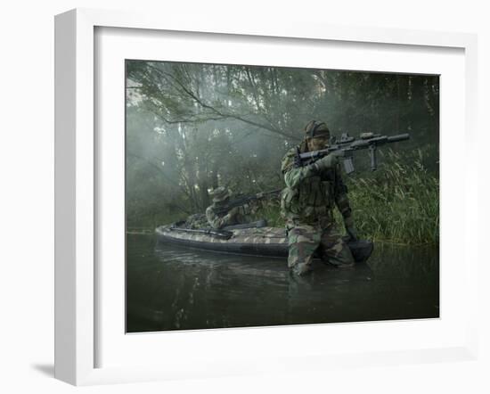 Navy SEALs Navigate the Waters in a Folding Kayak During Jungle Warfare Operations-Stocktrek Images-Framed Photographic Print