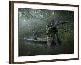 Navy SEALs Navigate the Waters in a Folding Kayak During Jungle Warfare Operations-Stocktrek Images-Framed Photographic Print