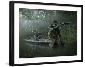 Navy SEALs Navigate the Waters in a Folding Kayak During Jungle Warfare Operations-Stocktrek Images-Framed Photographic Print